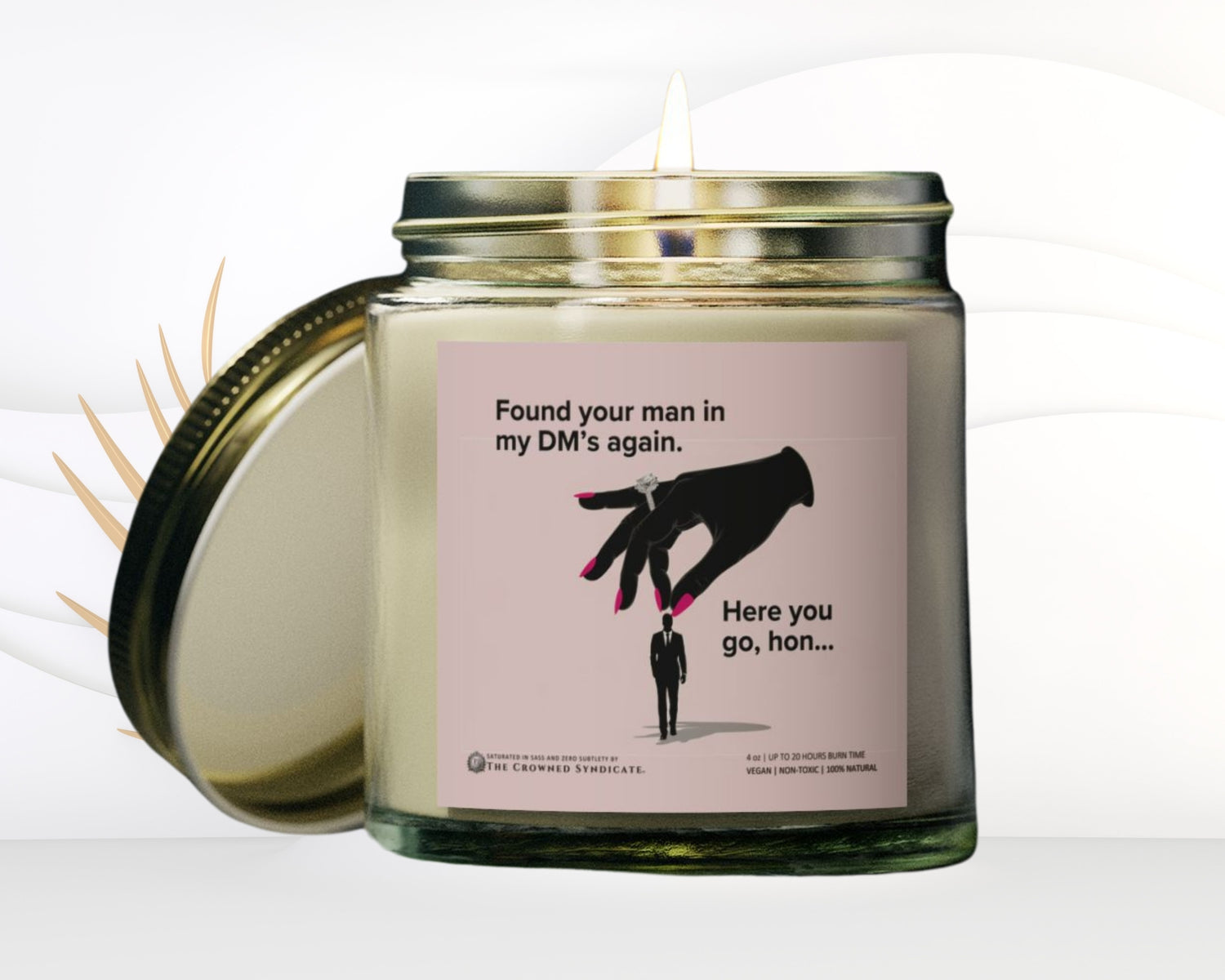 Candle jar with a humorous label on a white background