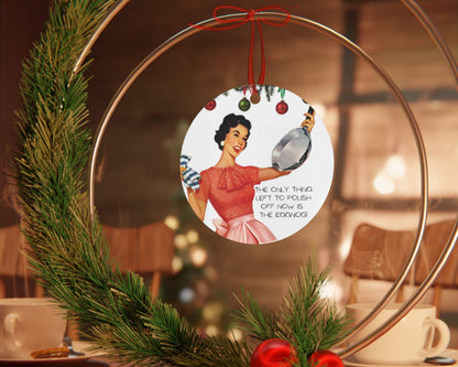 Decorative ornament with a vintage-style illustration of a woman holding a mirror, surrounded by greenery and red berries.