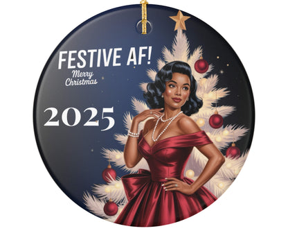 Decorative Christmas ornament with a woman in a red dress and festive tree, featuring 'Festive AF! Merry Christmas 2025' text.