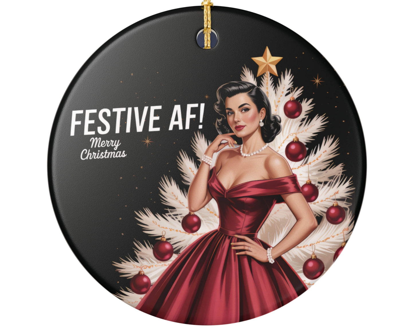Circular Christmas ornament with a woman in a red dress and festive decorations on a black background.