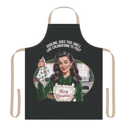 Black apron with a graphic of a woman holding a Christmas gift and text on a white background