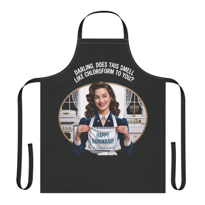 Black apron with a graphic of a woman holding a 'Happy Hanukkah' sign, with text on a white background.