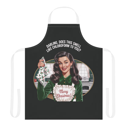 Black apron with a graphic design of a woman holding a Christmas-themed napkin and text on a white background.