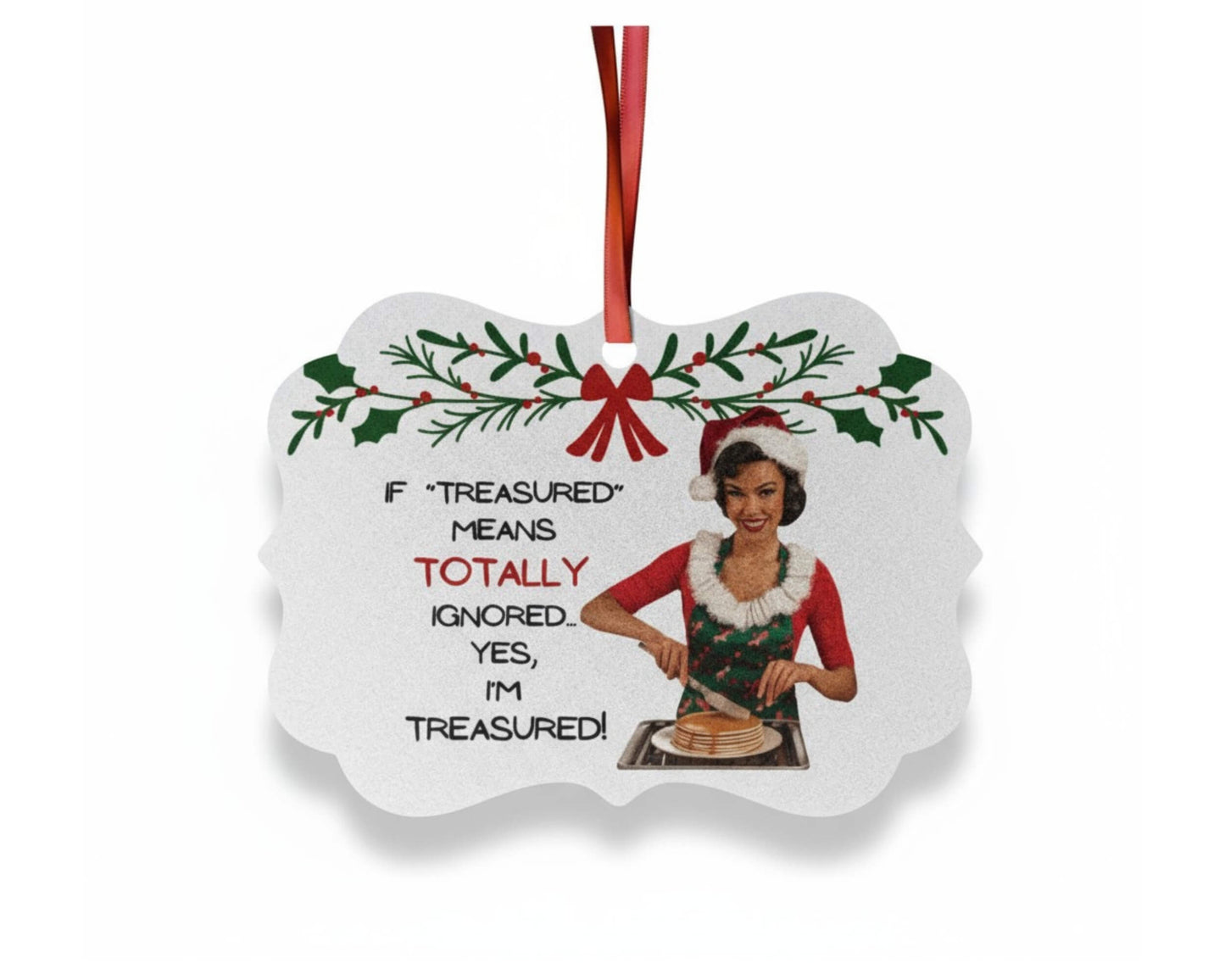 Decorative Christmas ornament with a design of a woman cooking, surrounded by holly and a red bow, on a white background.