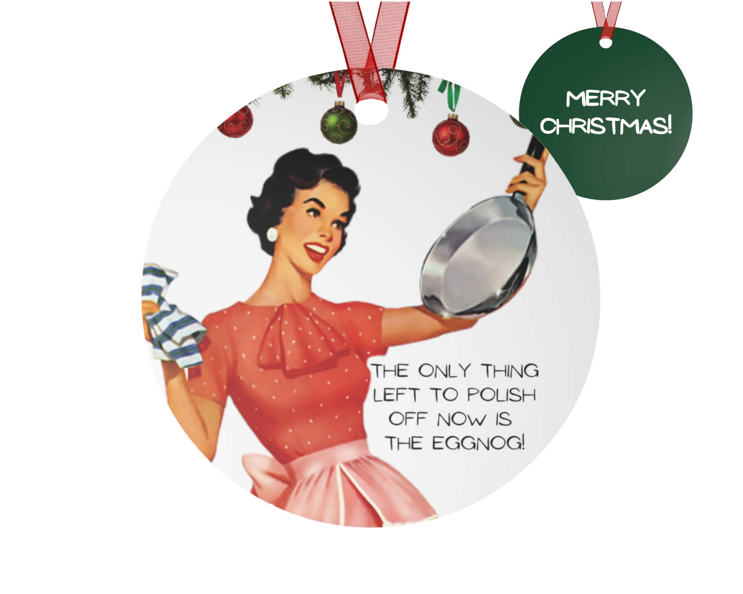 Vintage-style Christmas ornament with a woman holding an eggbeater and text 'Merry Christmas!'.
