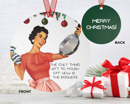 Christmas ornament with vintage-style illustration of a woman and text, surrounded by Christmas presents.