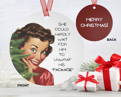 Christmas ornament with vintage-style illustration of a woman and text, surrounded by presents.