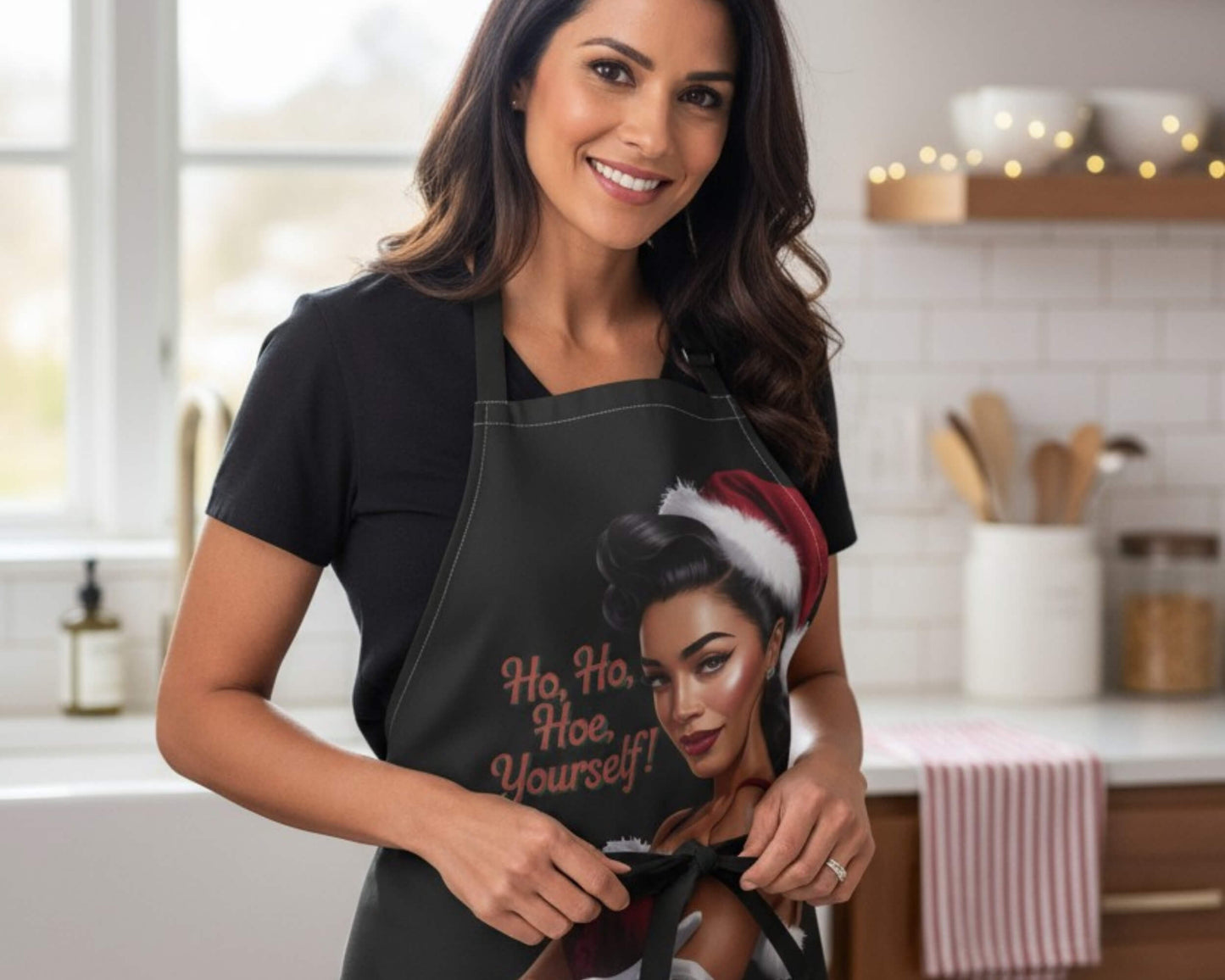 Close up of Ho Ho Hoe Yourself text on retro holiday black apron
